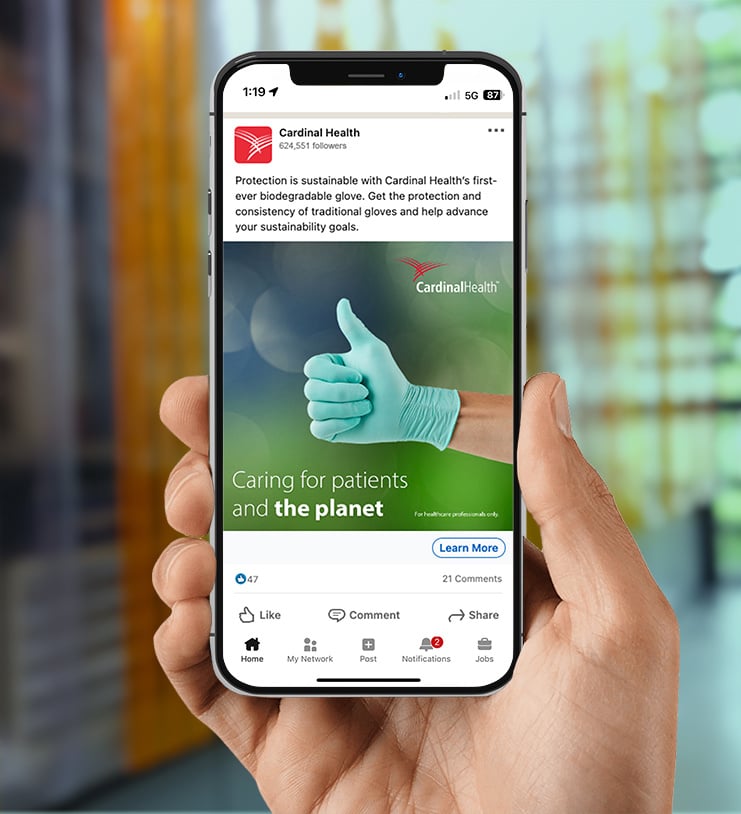 A smart phone showing another ad for Cardinal Health FLEXAL nitrile biodegradable gloves